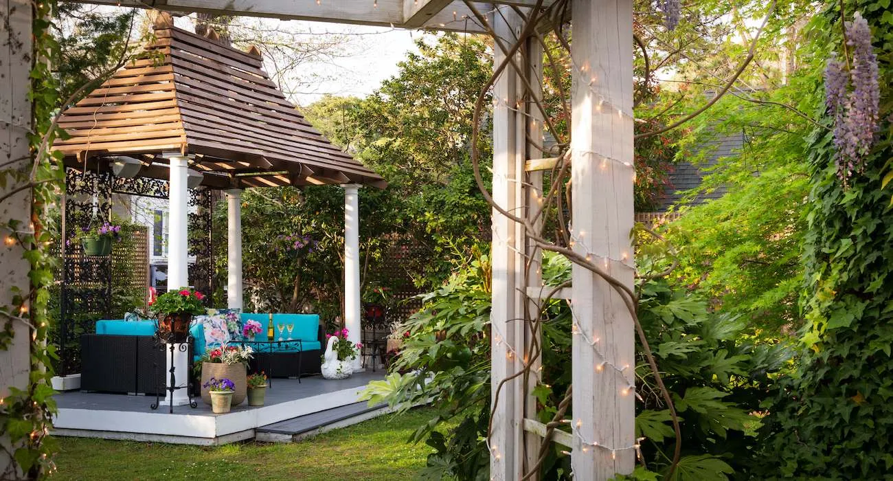 Garden arbor with turquoise seating